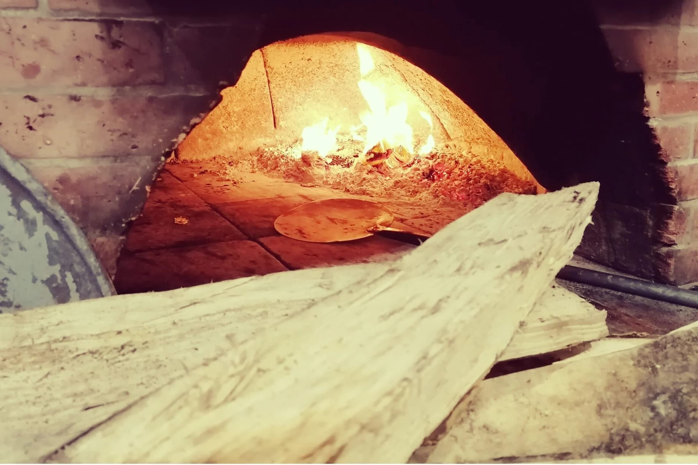 Four à bois et ambiance chaleureuse au restaurant Villa César